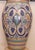 Italian stoneware vase with white glaze decorated with hand painting. Deruta is an Italian city with a very long tradition...