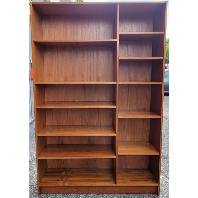 Domino Møbler Double-Bay 6-Shelf Teak Bookcase. Versatile storage or display with adjustable shelves and a wider bay on...