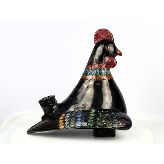 Large "hen" vase in sandstone 1950-60 in the style of Guidette Carbonnel. Glossy black enamel decorated with multicolored...