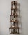 Vintage Folk Art Stepped Lattice Corner Shelf, Circa 1940s. Constructed from excess trim and plywood, this commanding...