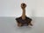 A delightful vintage art pottery sculpture in the playful style of Todd Warner, depicting a whimsically expressive ostrich...