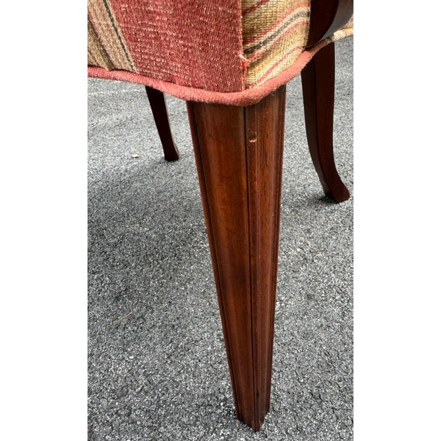 Beautiful mahogany Hepplewhite style mahogany armchair. Chair has nicely molded tapered front legs and beautifully carved...