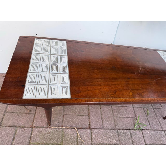 Lane Style No. 2091 Mid-Century Modern Coffee Table with Geometric Ceramic Tile Insets A rare and striking example of...