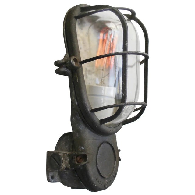 Industrial wall lamp made by industria rotterdam cast aluminum with clear glass e27/e26. Depending on destination, all...