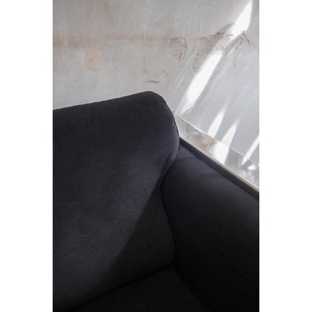Upholstered structure covered in black velvet, complete with shaped seat and back cushions. Polished chrome-plated steel...