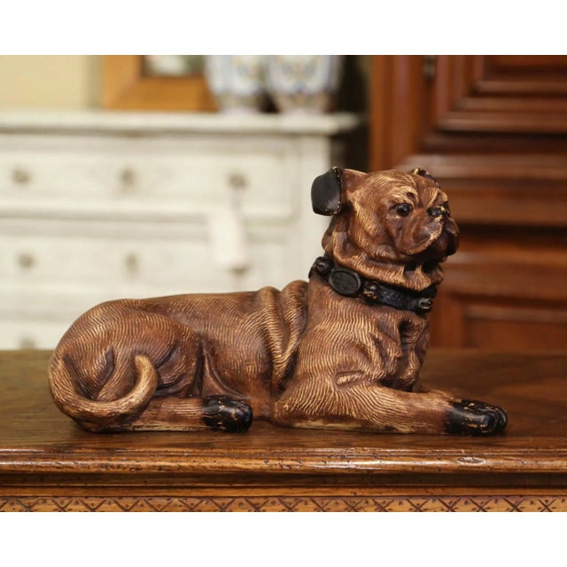 Dog lovers will appreciate this realistic vintage pug. Crafted in France, circa 1950, the antique dog sculpture features a...