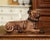 Bring character and charm to a tabletop or console with this delightful antique French terracotta dog sculpture, crafted...