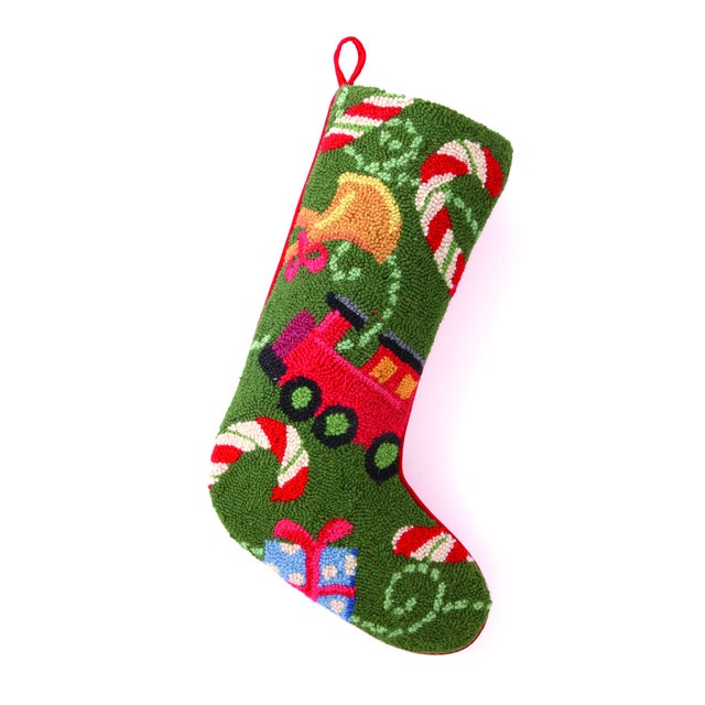 100% wool hooked stocking with cotton/velvet blend backing. A festive way to spruce up your home for the holidays or would...