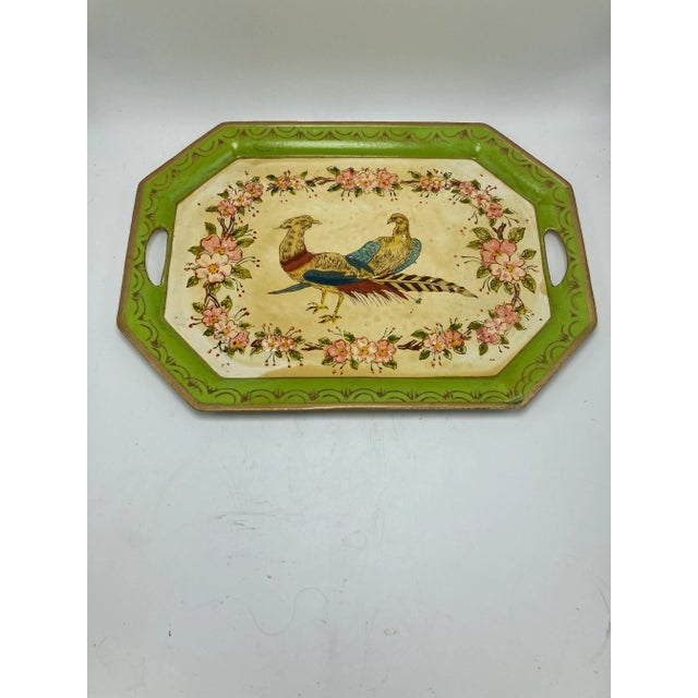 Lovely to use or to display! This vintage piece is colorful with a beautiful design of birds and flowers