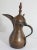 19th century Middle Eastern traditional Arabian tinned copper and brass Dallah coffee pot. Coffee pot hand-hammered and...