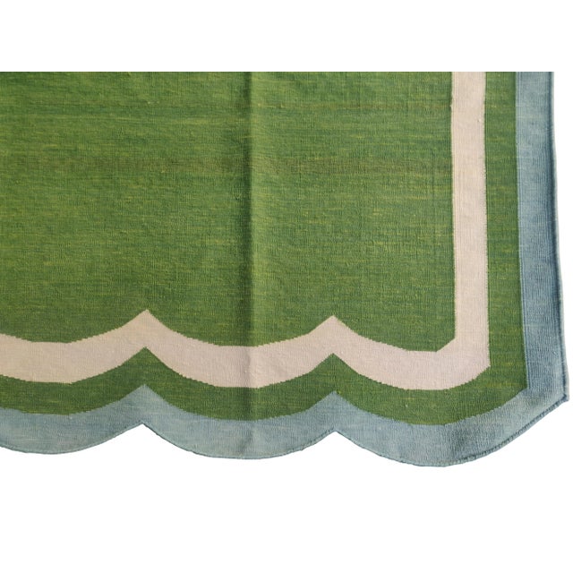 Contemporary Handmade Cotton Scalloped Rug, Moss Green with Cream and Light Blue Border 6'x9' For Sale - Image 3 of 6