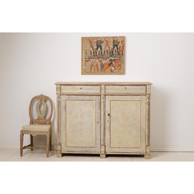 Antique Swedish empire sideboard. Genuine country house furniture from northern Sweden made around 1840 during the empire...