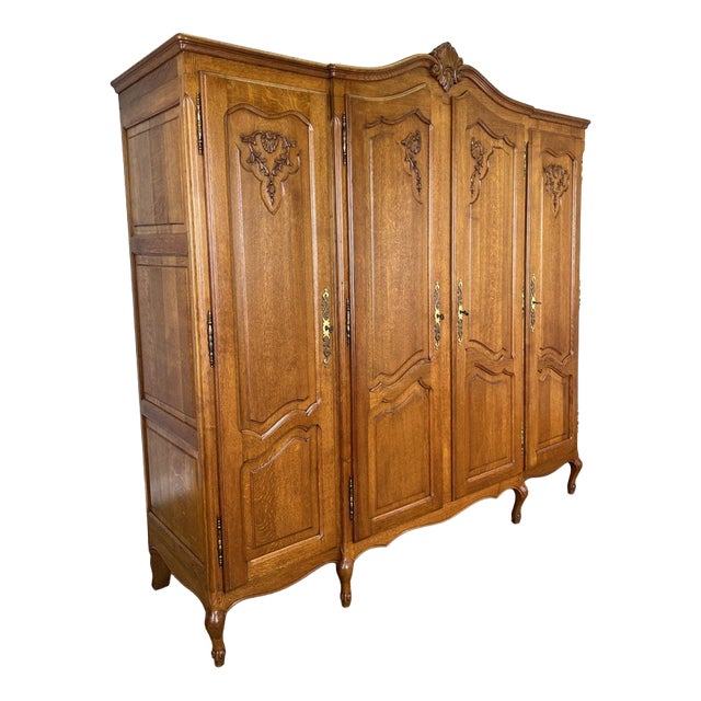 Vintage French Louis XVI Style Carved Oak 4-Door Wardrobe For Sale