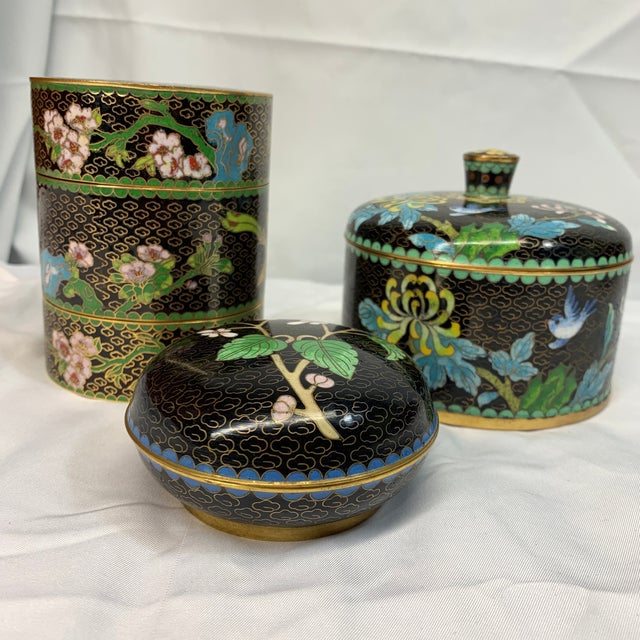 Bring timeless elegance into your home with this gorgeous three-piece vintage Chinese cloisonné collection. Each piece...