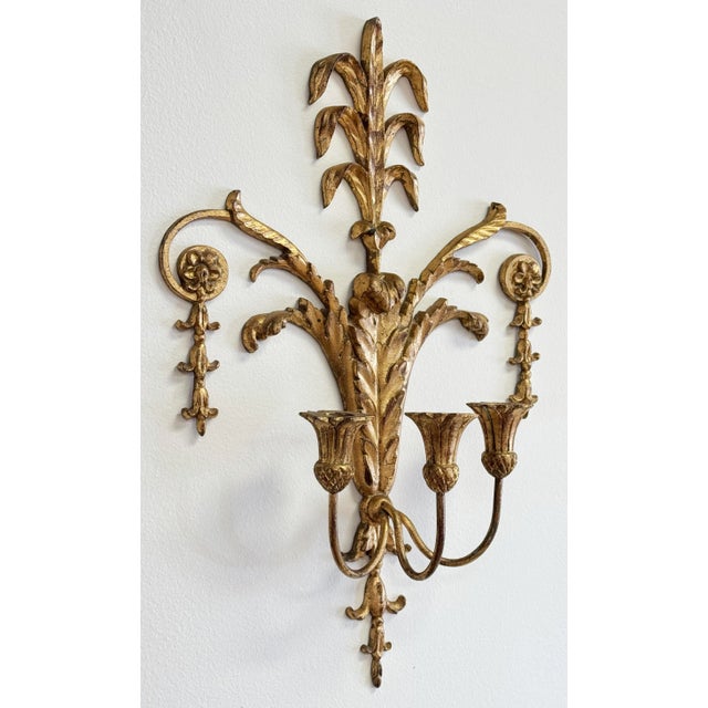 Large vintage Italian gold gilt candle wall sconce featuring intricate sheaf of wheat flourish design to metal body with...