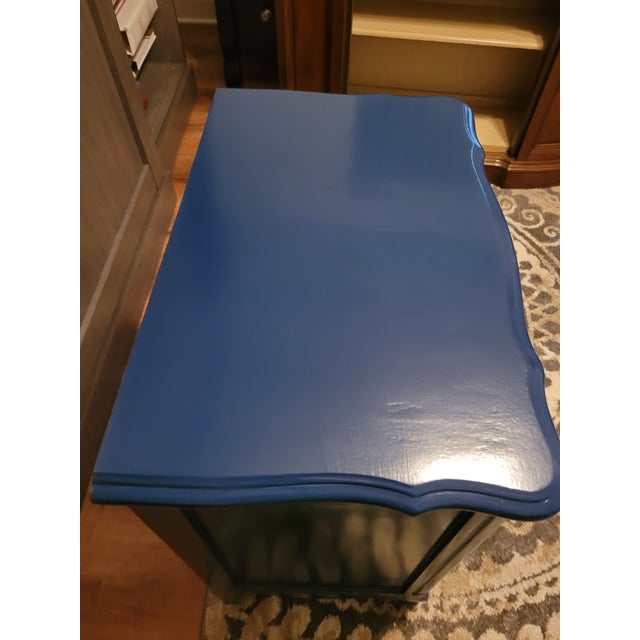 Elevate your bedroom decor with this stunning refinished Drexel nightstand, expertly transformed into a chic midnight blue...