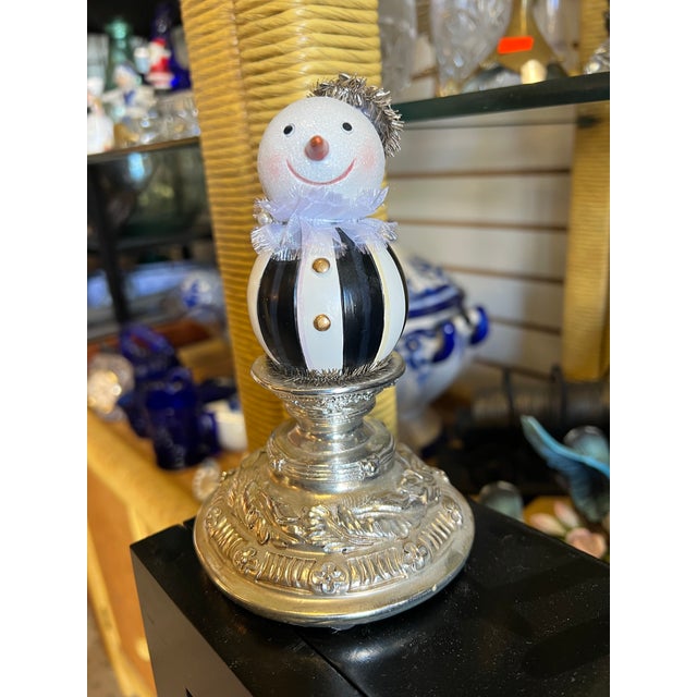 This item is part of a collectible holiday decor series from MacKenzie-Childs. Features a hand-painted body in the brand's...