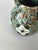 This Jean Gerbino terre mêlée mosaic vase, produced in the Vallauris region of France during the mid-20th century, is a...