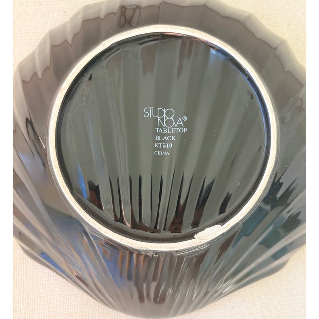 Totally 80’s fabulousness! This glossy black ceramic dish/catchall from Studio Nova Tabletop is the perfect way to add a...