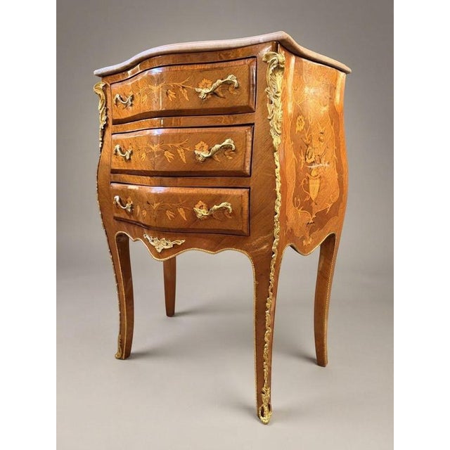 Elevate your bedroom with this exquisite pair of bedside lockers, beautifully crafted with mahogany and kingwood veneers...