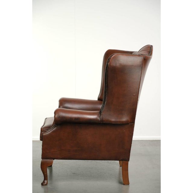 1990s English Brown Cowhide Chesterfield Wing Lounge Chair For Sale - Image 5 of 13
