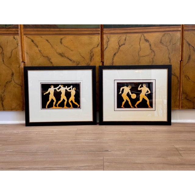 A pair of early 19th century English hand painted engravings of ancient Greek vases from the collection of Sir William...
