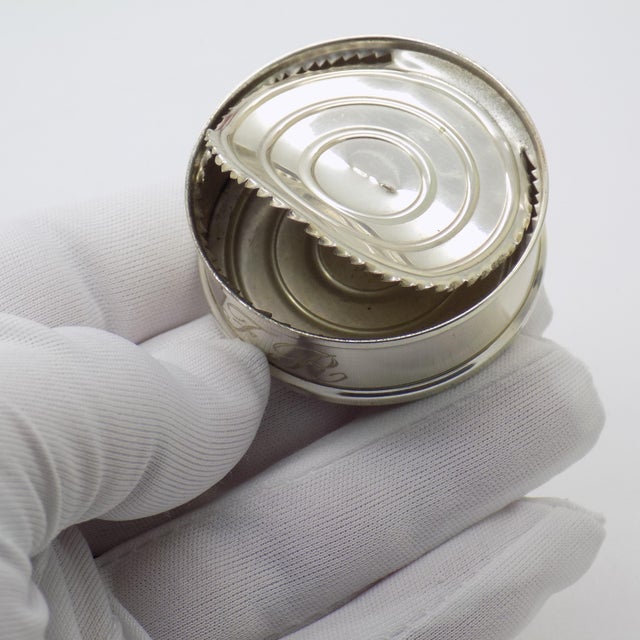 A rare and unusual vintage miniature depicting an open can, handmade in florence between the 1980s and 1990s, showcasing...