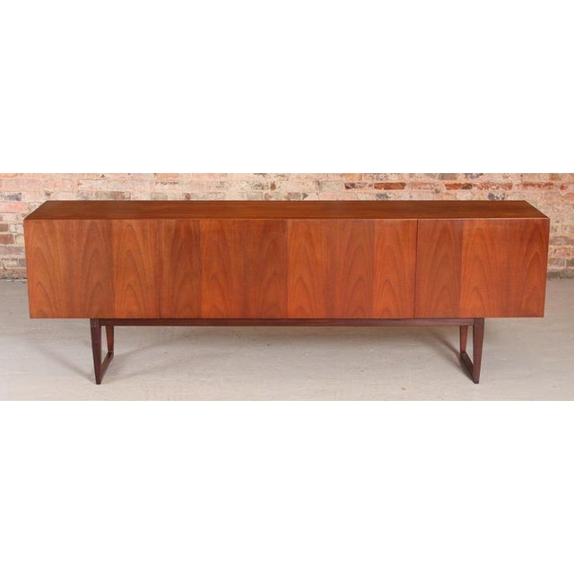 Mid Century long teak 'Monza' sideboard by Everest for Heal's, circa 1960s. The design is attributed to Andrew Milne. 5...