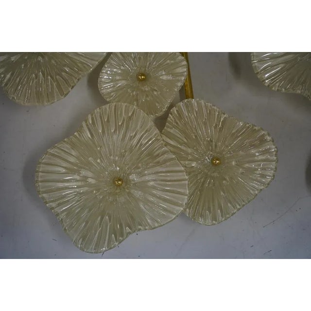 Wonderful piece of Murano that can be mounted both as a wall lamp and as a ceiling chandelier. Particular and original...