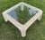 A Classic Boho modernist cocktail table circa 1970s. It features woven rattan with inlaid glass. Very clean and ready to...