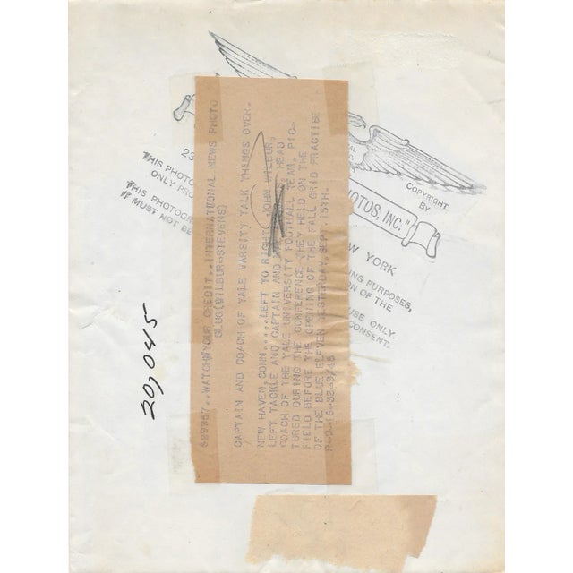 1932 sepia tone photograph of Yale Captain John Wilbur and Coach Mal Stevens (1900-1979). Yale went 2-2-3 in 1932,...