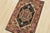 A traditional tribal Heriz rug hand-knotted with an all-wool pile on a cotton foundation. This oriental rug features a...