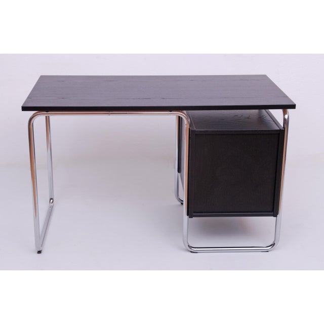 For sale is a bauhaus desk contor st 2000 by l. & c. Stendal in black table legs made of chrome. I have official proof of...