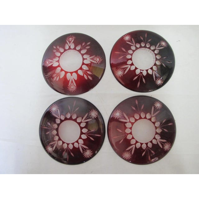 Darling set of 4 vintage Bohemian ruby red plates. Red crystal with clear cut daisy design. Each measures approximately 6...
