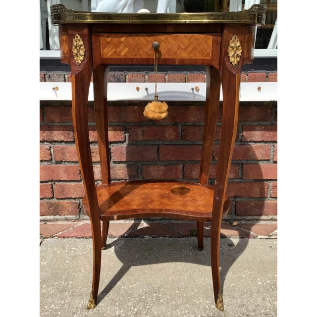 Gorgeous 18th Century French Transition Side Table with Marble Top. Beautiful Marquetry details and bronze ormolu.