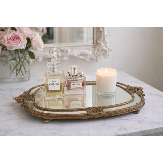 A beautifully detailed antique French-style vanity or dresser tray, featuring an elegant gilt metal (ormolu) frame with...