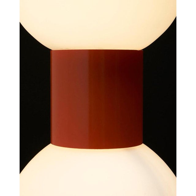 Bring a touch of 1970s Pop Art energy into your home with this table lamp, model "T 144," manufactured by the German firm...