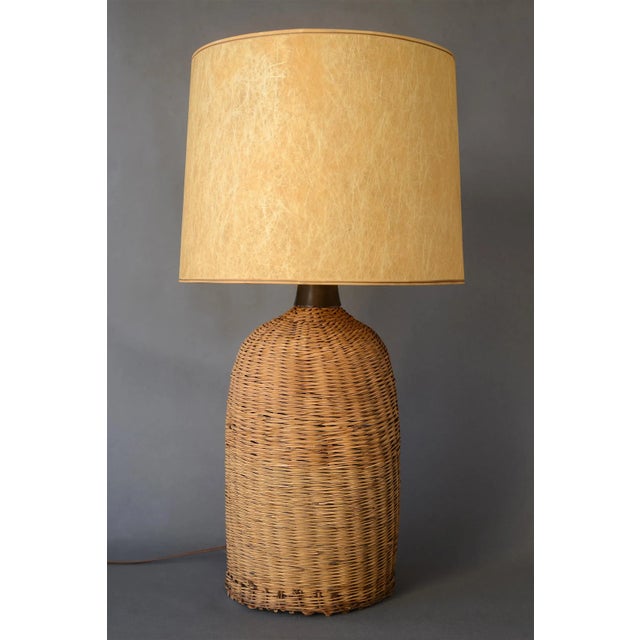 This vintage boho beauty has charm in the truckload! Made of woven wicker with a hollow interior and covered on the bottom...