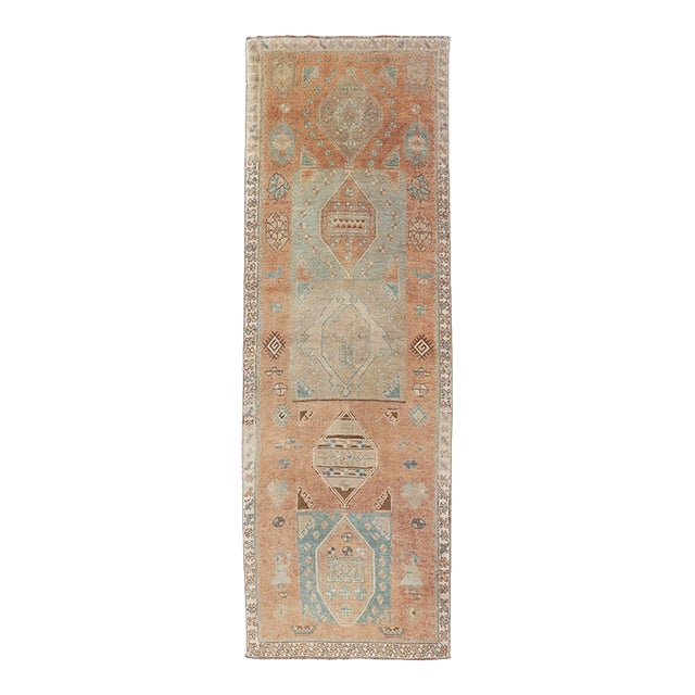 Tribal Medallion Design Antique Persian Kurdish Rug in Warm Earth Tones For Sale