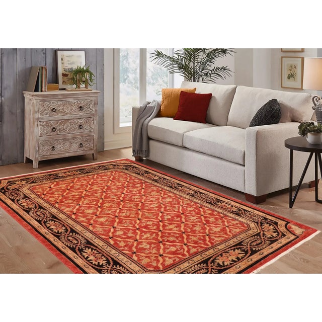 "Enhance the ambiance of your home with this magnificent Persian-influenced Turkish hand-knotted rug made by skilled...