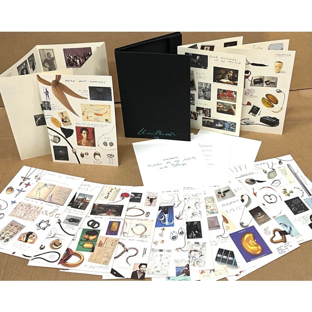 Elsa Peretti and Tiffany & Co. 50 year retrospective book: A unique black linen slip case containing unbound, removable...