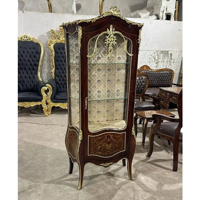 In love with the details. Stunning French vitrine. Has been refinished in Italy. Has a beautiful gold details in the door....