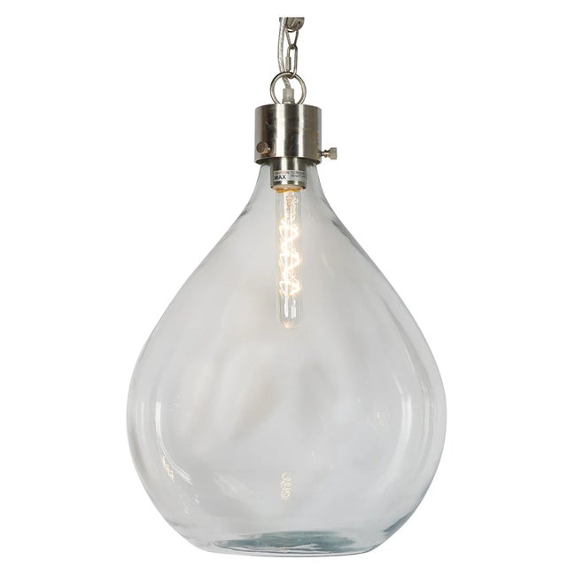 The Wine Sphere is sure to leave a warm impression in any home. In its industrial design, the central lightbulb hangs...
