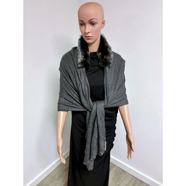 Wrap yourself in French elegance with this luxurious Evelyne Prélonge shawl. Handcrafted in France, the design combines a...