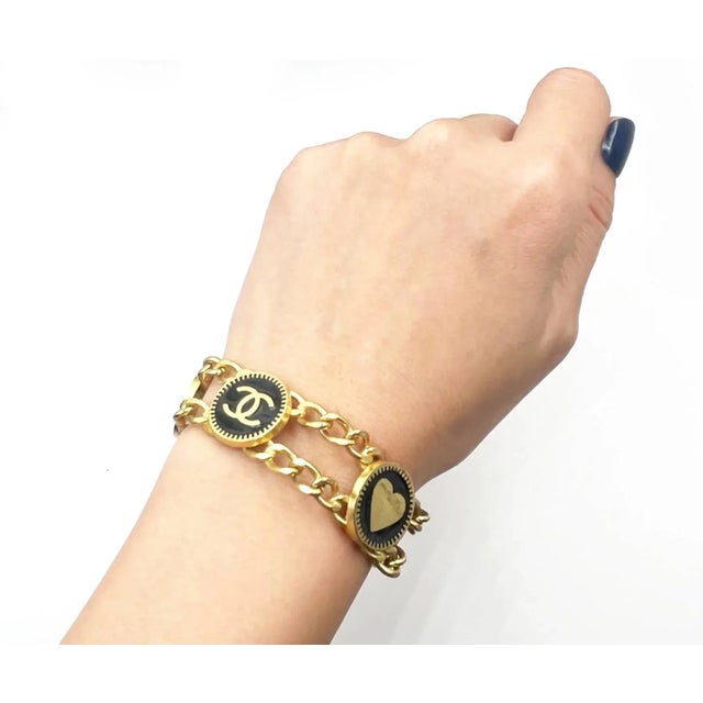 Contemporary Chanel Vintage Gold Plated CC Heart Star Black Coin Bracelet For Sale - Image 3 of 4