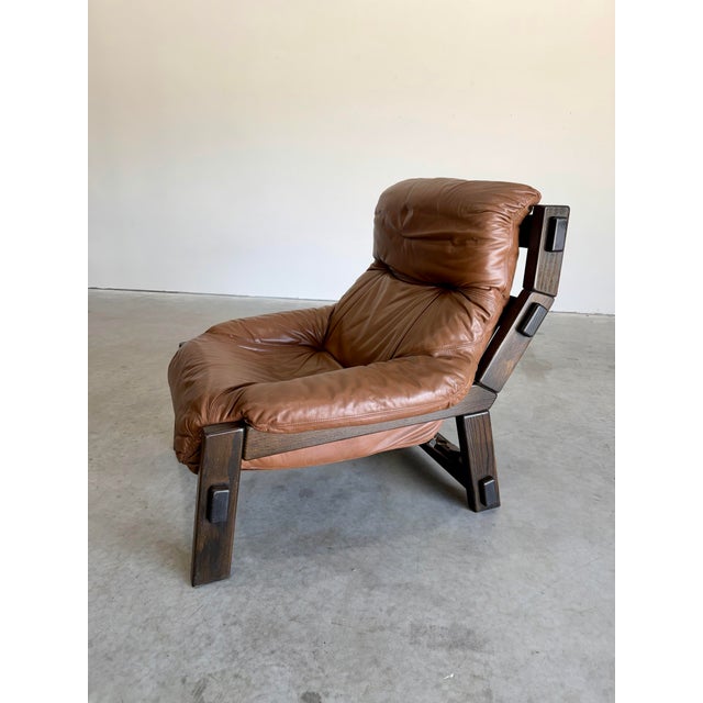 Vintage Dutch Brutalist Brown Leather and Wood Lounge Chair. Attributed to Gerard Van Den Berg for Montis Netherlands...