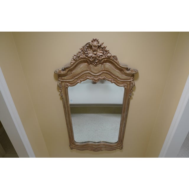 This stunning vintage La Barge wall mirror features an ornate inspired design with beautifully carved detailing throughout...