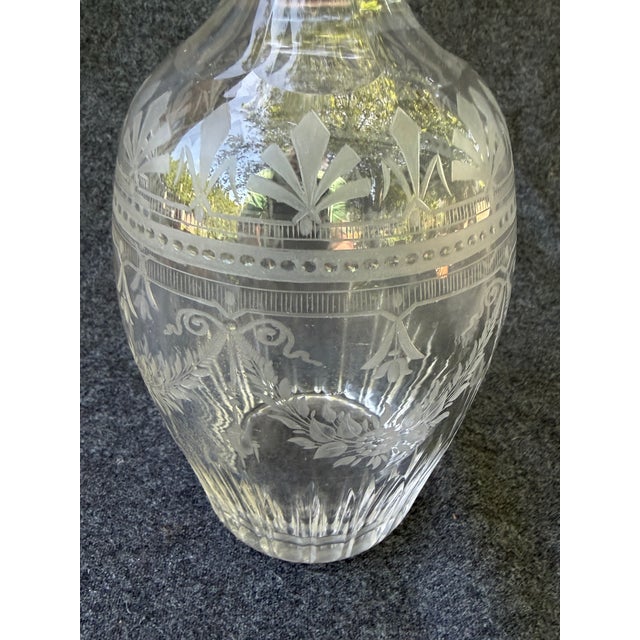Stunning antique etched, cut crystal decanter. Ornate floral swags, curled ribbon, dot and tiny stripe etched designs...