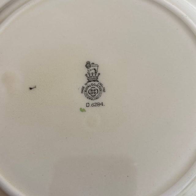 Royal Doulton The Squire plate 1909-1940. These plates are beautiful. The painting on them is really detailed and rich....