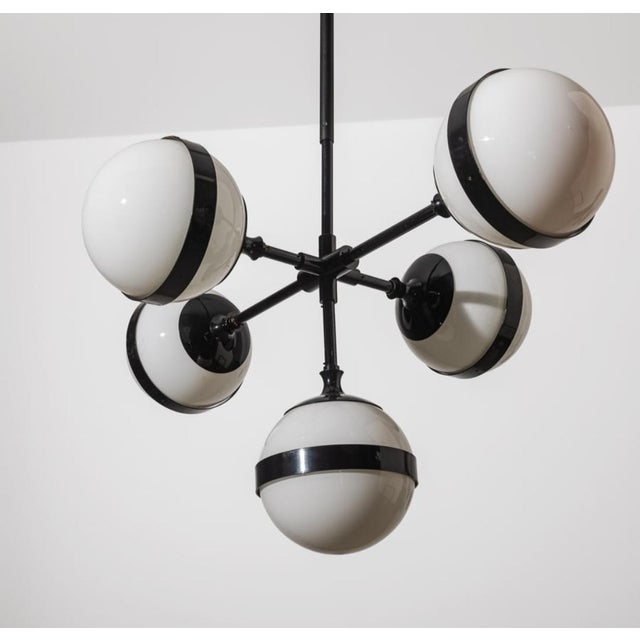 Model Peggy Chandelier in Black Lacquered Iron with Opaline Spheres with Central Lace by Hangar Design Group for Showy, in...